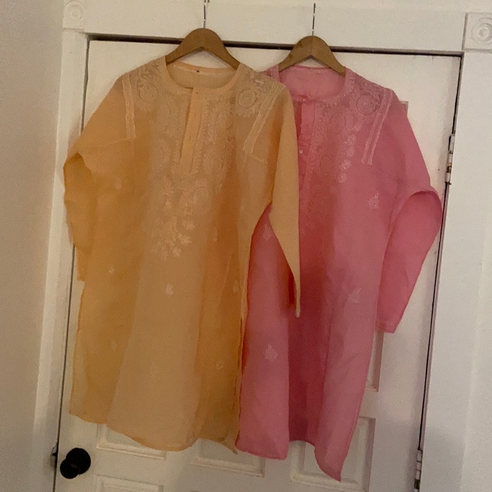 2 beautiful tunic tops never worn
